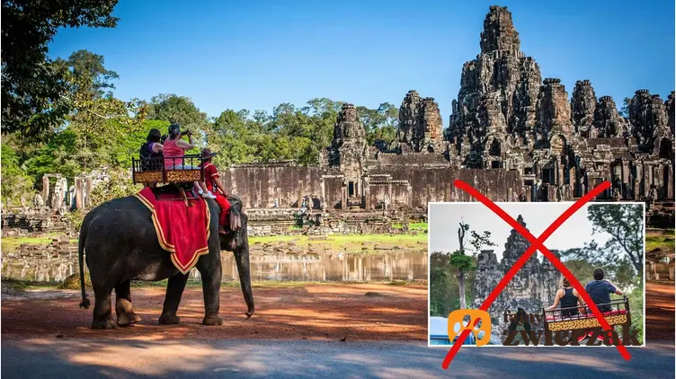 Turyści zwiedzają kompleks świątynny Angkor Wat w Kambodży, jadąc na słoniu